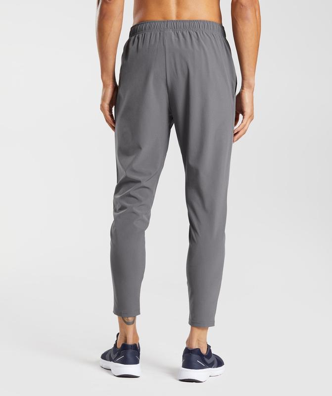 Gymshark Arrival Woven Joggers Broek Grijs | 75NAROVGM