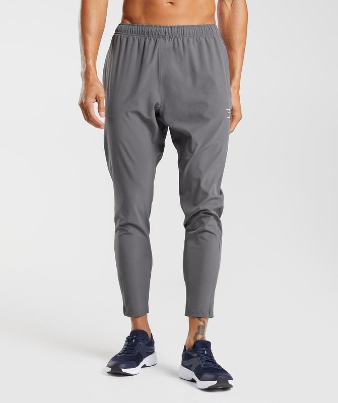 Gymshark Arrival Woven Joggers Broek Grijs | 75NAROVGM